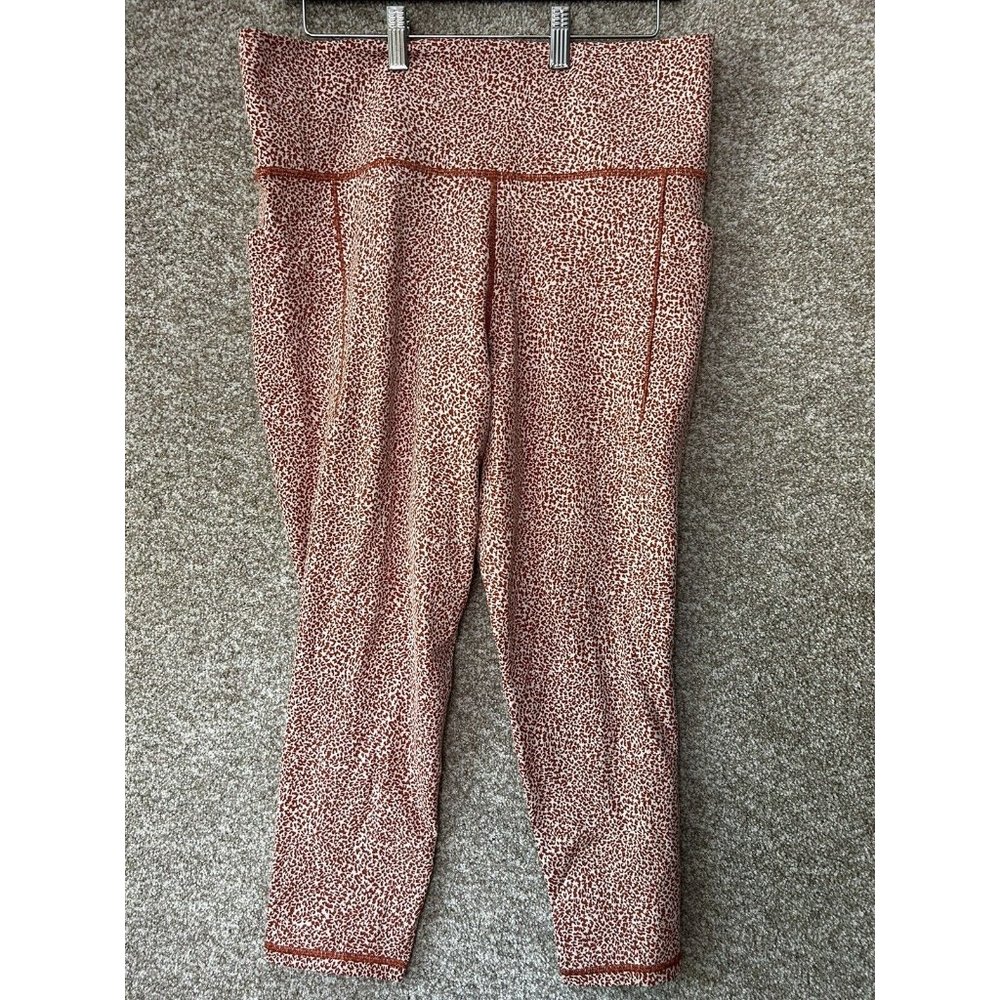 Athleta Salutation Stash Pocket II 7/8 Textured Tight  Leggings Animal Orange XL